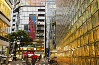 Japan, Honshu, Tokyo, Ginza district modern building clad in glass bricks. 
Photo : Jon Burbank