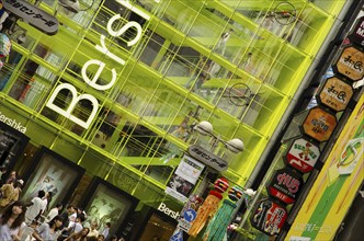 Japan, Honshu, Tokyo, Shibuya district exterior of glass fronted Berskha shop. 
Photo : Jon