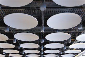 England, London, Heathrow Airport Terminal 5 disc ceiling in departures area. 
Photo : Paul