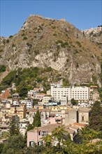 Italy, Sicily, Taormina, View of Saracens Castle above the town. 
Photo : Mel Longhurst