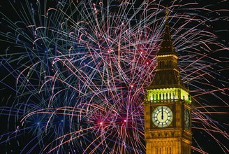 England, London, New Years fireworks display behind Big Ben. 
Photo : Chris Penn