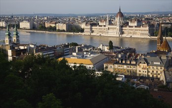 Buda Castle District view over Danube and Pest with Parliament Building.