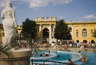 Pest Outdoor bathing in summer at Szechenyi thermal baths largest in Europe.