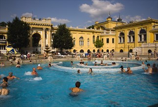 Pest Outdoor bathing in summer at Szechenyi thermal baths largest in Europe.