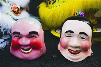Papier mache character heads for Chinese New Year show.