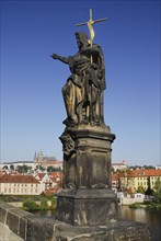 Charles Bridge Statue of John the Baptist with St Vitus.