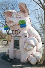 Bank ATM housed in a pig effigy in the Wurstelprater amusement park.