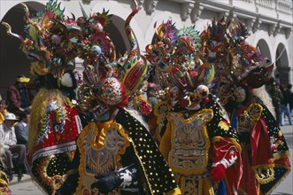 Bolivia, Oruro, La Diablada Carnival procession and spectators. Photo : Eric Lawrie