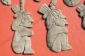 Mexico, Veracruz, Papantla, Relief carving of Totonac figures on the Mural Cultural Totonaca in the
