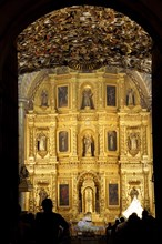 Mexico, Oaxaca, Santo Domingo Church Ornately decorated interior with carved and gilded altarpiece.