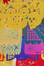 Mexico, Oaxaca, Brightly coloured decorations and symbols for Dia de los Muertos or Day of the Dead