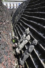 Mexico, Federal District, Mexico City, Stone sculptures and part view of pyramid steps in Templo