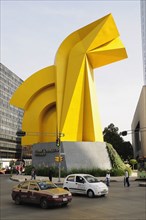 Mexico, Federal District, Mexico City, Traffic passing Little Horse sculpture of Torre Caballito on