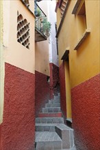 Mexico, Bajio, Guanajuato, Callejon del Beso Narrow street with steep flight of steps ascending