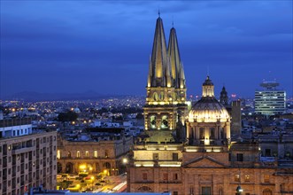 Mexico, Jalisco, Guadalajara, View of Cathedral and city at night. Photo : Nick Bonetti