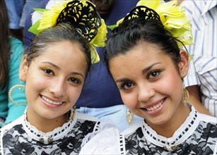 Mexico, Jalisco, Guadalajara, Portrait of two young women Jalisco folkloric dancers. Photo : Nick