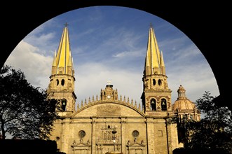 Mexico, Jalisco, Guadalajara, Plaza Guadalajara Exterior facade of cathedral and bell towers framed
