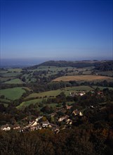 England, Gloucestershire, South Cotswolds, View west from Tyndale Monument over the village of