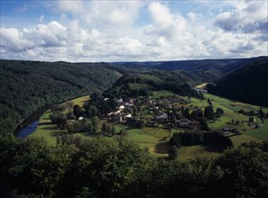 Belgium, Luxembourg, Frahan, View from Rochehaut over village beside the River Semois surrounded by