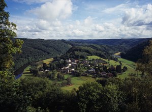 Belgium, Luxembourg, Frahan, View from Rochehaut over village beside the River Semois surrounded by