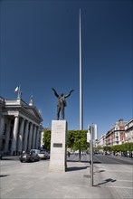 Ireland, Dublin, Jim Larkin and the Spire in OConnell Street with General Post Office on the left.