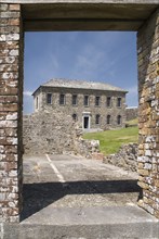 Ireland, County Cork , Kinsale, Charles Fort Museum building seen through the door way of a ruined