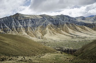 Nepal, Upper Mustang, Landscape, Layered mountain structure near Lo Manthang city. Photo : Sergey