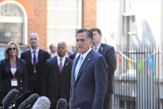 England, London, US Republican Presidential hopeful Mitt Romney addresses journalists outside 10