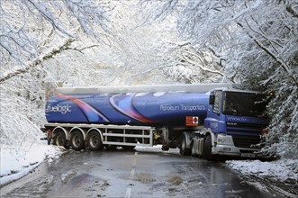 Weather, Winter, Snow, Jack-knifed fuel tanker on icy A22 main road near Nutley East Sussex after