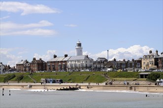England, Suffolk, Southwold, Historic seafront with lighthouse from the pier. Photo : Bob Battersby