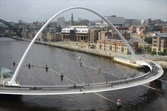England, Tyneside, Gateshead, Millennium Bridge in closed position from the Baltic Arts Centre