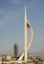 England, Hampshire, Portsmouth, Spinnaker Tower and Gunwharf Quay shopping center seen from the