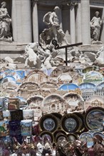 Italy, Lazio, Rome, Display of tourist souvenir gifts beside the baroque Trevi Fountain by Nicola