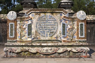 Vietnam, Hue, Ceramic mosaic on a wall at the tomb of Emperor Tu Duc. Photo : Mel Longhurst