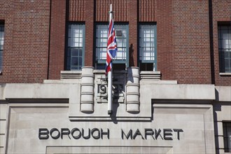 England, London, Borough Market entrance with union flag flying.England London Southwark Borough