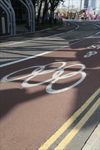 England, London, Stratford Olympic Games Lane marked on road. Photo : Sean Aidan