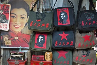 China, Shanghai, Revolutionary kitsch on sale at at Dongtai antique market Chairman Mao Zedong and