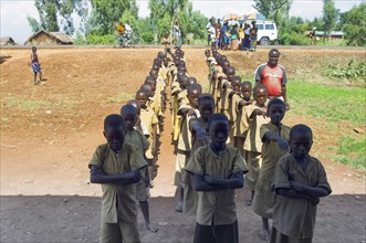 Burundi, Cibitoke Province, Buganda, Ruhagurika Primary Students lining up ready to go into their