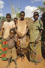 Burundi, Cibitoke Province, Kirundo, A family beside the road living in poverty child with obvious