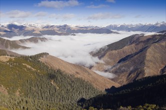 China, Szechuan Province, Tibet, High altitude view across mountains and valleys in Tibetan region