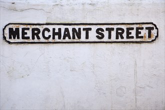 England, West Sussex, Bognor Regis, Old cast iron road sign for Merchant Street. 
Photo Stephen