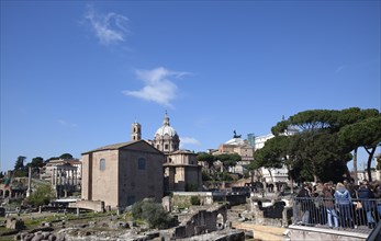 Italy, Lazio, Rome, View over the ruins of the Roman Forum from Via Fori del Imperial. 
Photo