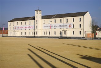 Ireland, North, Derry, Former Ebrington Barracks building with Derry 2013 Year of Culture banner.