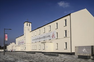 Ireland, North, Derry, Former Ebrington Barracks building with Derry 2013 Year of Culture banner.