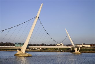 Ireland, North, Derry, The Peace Bridge over the River Foyle opened in 2011 with the former