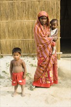 Bangladesh, Dhaka Division, Tangail Sadar Upazila, Mother and children on the impoverished chars,