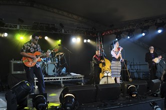 Music, Strings, Guitars, Irish Rockabilly singer Imelda May and her band performing at the 2010