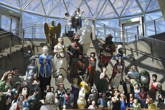 England, London, Display of figureheads in the new Cutty Sark exhibition space.