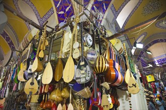 Turkey, Istanbul, Fatih  Sultanahmet  Kapalicarsi  Music stall displaying various musical instruments in the Grand Bazaar.