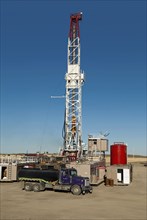 Canada, Alberta, Del Bonita, CanElson Drilling Inc of Calgary fracking for tight shale oil in a wheat field at the edge of the Baaken play.